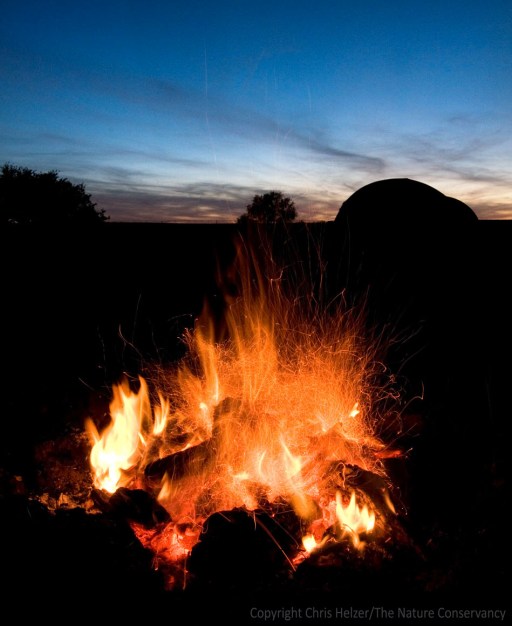 Camp fire at the Helzer prairie by Stockham, Nebraska.