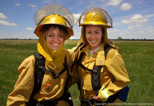 Anne Stine (left) and Eliza Perry (right), dressed up for a prescribed fire - one of many new experiences during their first three weeks on the job.