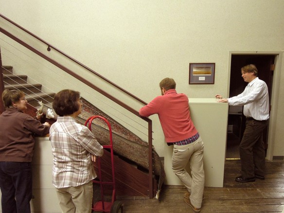 Staff at the Omaha field office of The Nature Conservancy - moving furniture.
