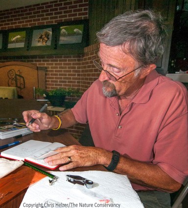 Mike Schrad records data from one of his trapping efforts.  Mike is a Nebraska Master Naturalist, one of many volunteers being deployed around the state to help with conservation and science projects.