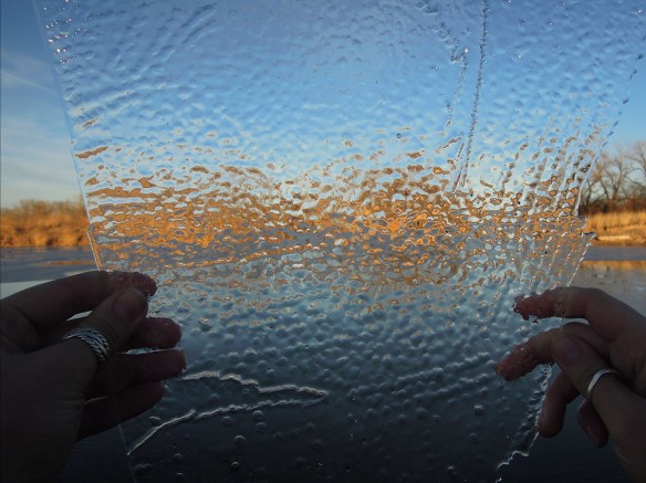    At this point, my fingers were that odd red-hot feeling from the cold, so I gave up. I just loved how beautifully the ice distorted the landscape.  