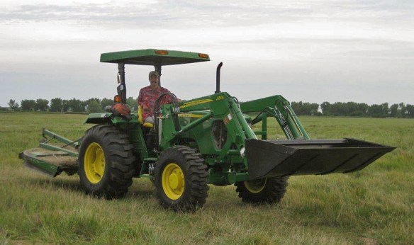 Dillon driving the John Deere. Self portrait by Dillon Blankenship.