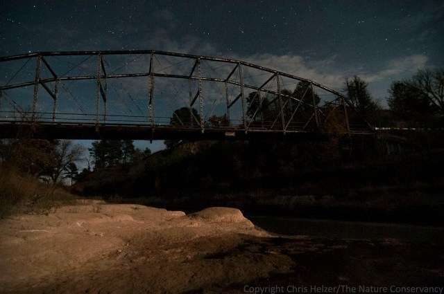 Norden bridge at the TNC Niobrara Valley Preserve. Moonlight, clouds, and stars.