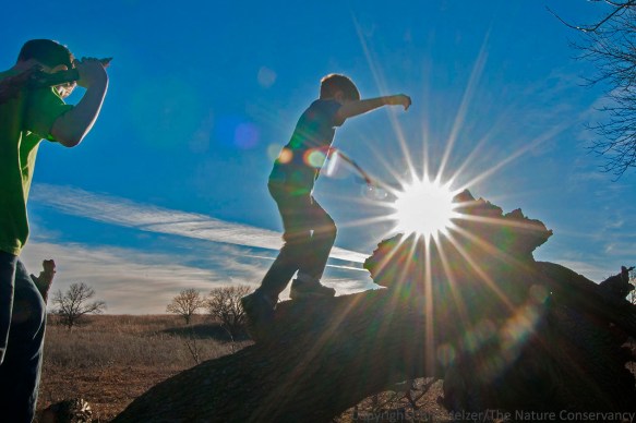 Boys with sticks. Helzer family prairie, Nebraska. Atticus (left) and Calvin Miller - stepsons of the photographer.