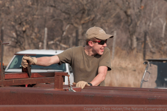 My son John, laughing with other workers at this year's roundup of the west bison herd at The Niobrara Valley Preserve.